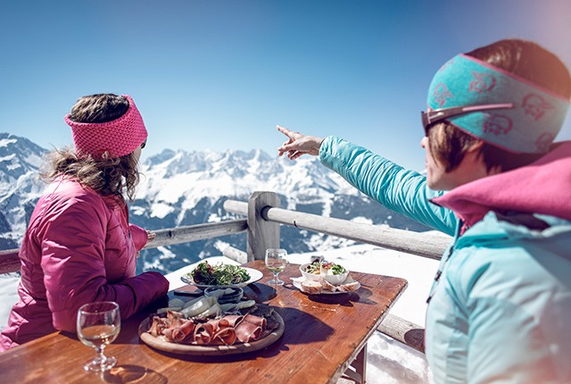 Dining outside with a view of the vista mountains. Saas-Fee.