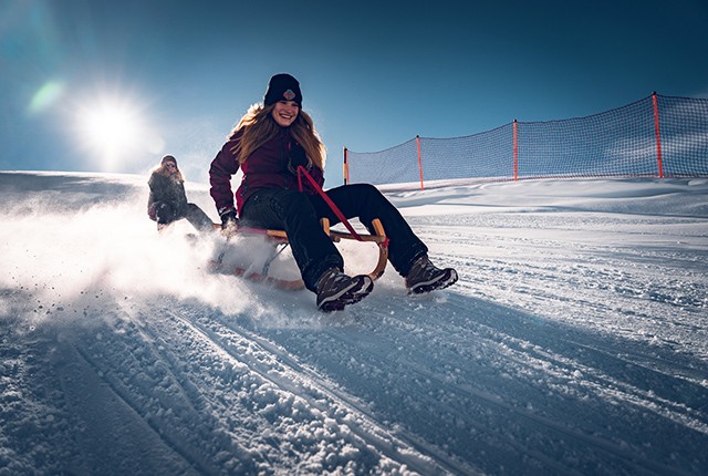 Gornergrat, sledding, young women.