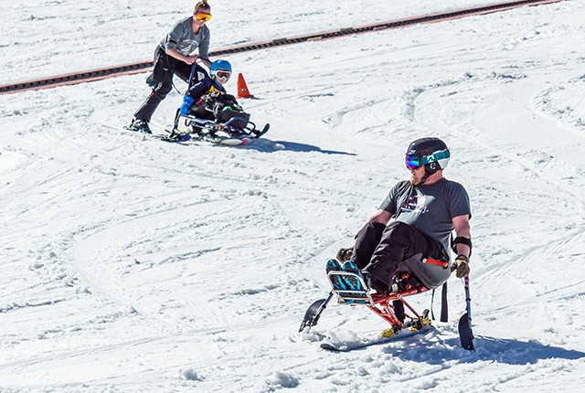 FR-disabled handicap skiers.