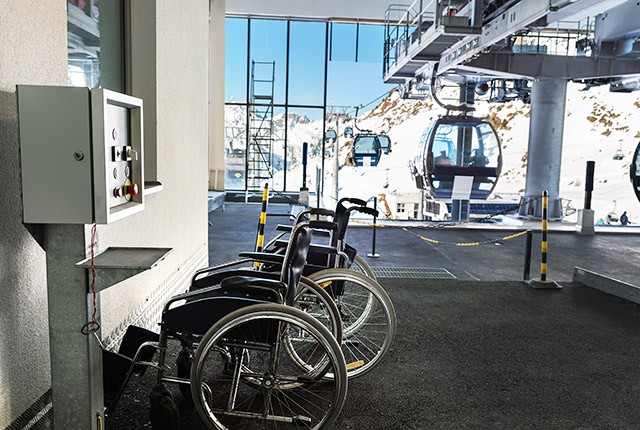 FR-wheel chairs by gondola Europe disabled skiing.